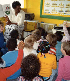 kindergarten teacher reads Kelly Bear book to class